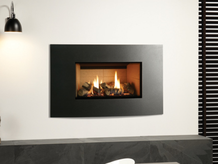 The Riva2 670 Verve XS gas fire offers the same subtly curving form as the Riva2 530 &amp; Riva2 670 Verve gas fire but with slimmer proportions to offer a different aesthetic appeal for narrower walls or spaces.  The Riva2 670 Verve XS gas fire comes in smart Graphite or can be finished in one of four striking additional colour options to suit your interior tastes. The highly realistic fire is enhanced by Gazco’s stunning glowing ember bed, offering all the ambiance of a real log flame in the modern convenience of a high efficiency gas fire.  Finishes: Graphite, Metallic Red, Metallic Bronze, Metallic Blue and Ivory.  Linings: Vermiculite, Brick effect and Black Reeded.  Fuel Bed: Logs.  Command Controls: Thermostatic remote.£